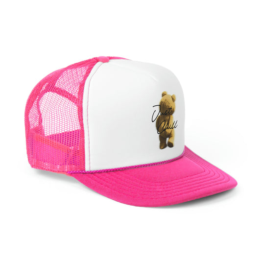 Side view - Vintage-inspired trucker hat in pink, featuring a mesh back and snapback closure. Retro design with a curved brim, perfect for a casual and stylish addition to your accessories.