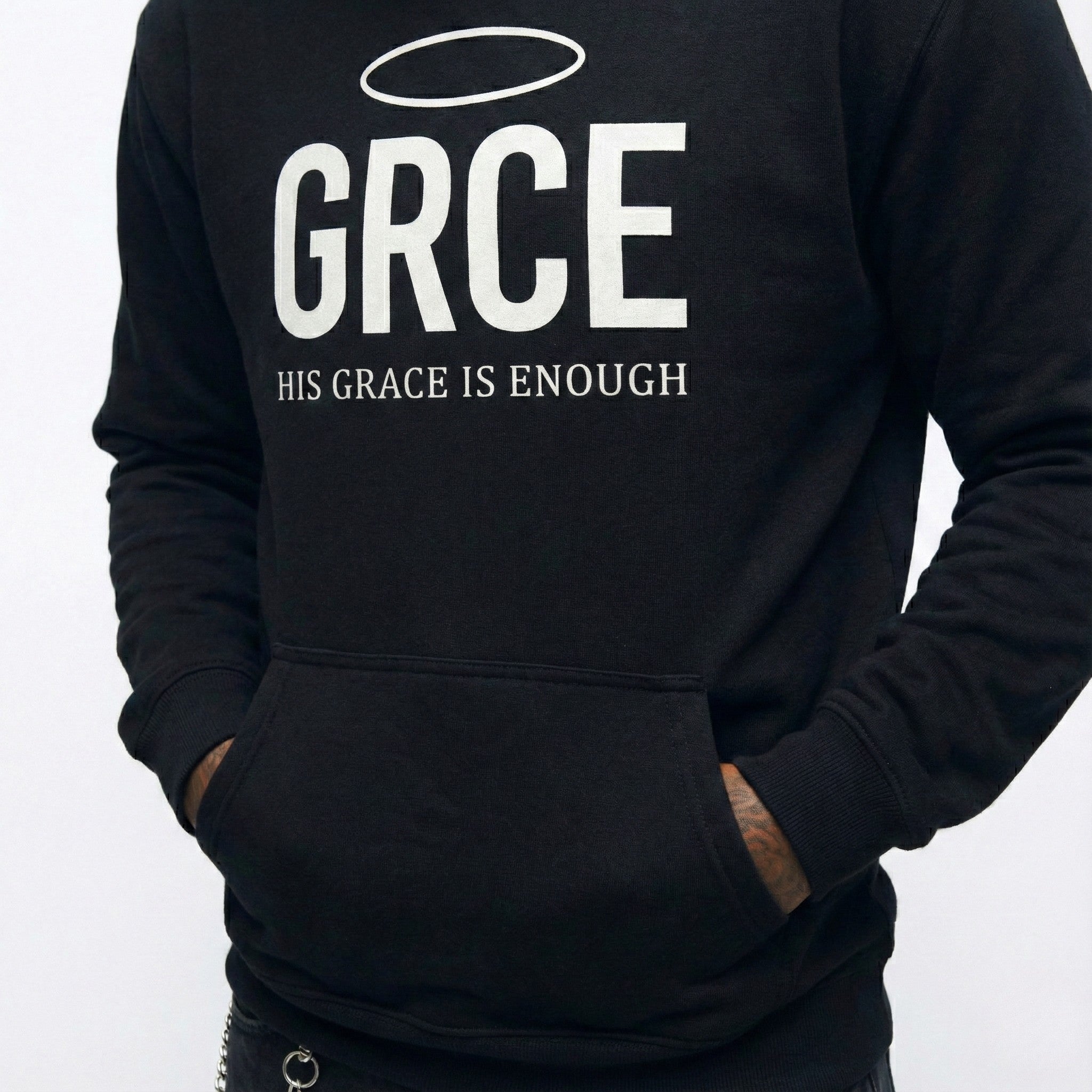 Black hoodie with 'GRCE' and 'His Grace is Enough' text on a white background