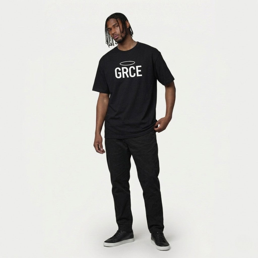 Person wearing a black t-shirt with 'GRCE' text on a white background