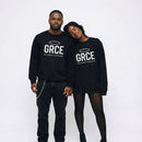 Two people wearing black sweatshirts with 'GRCE' text on a white background