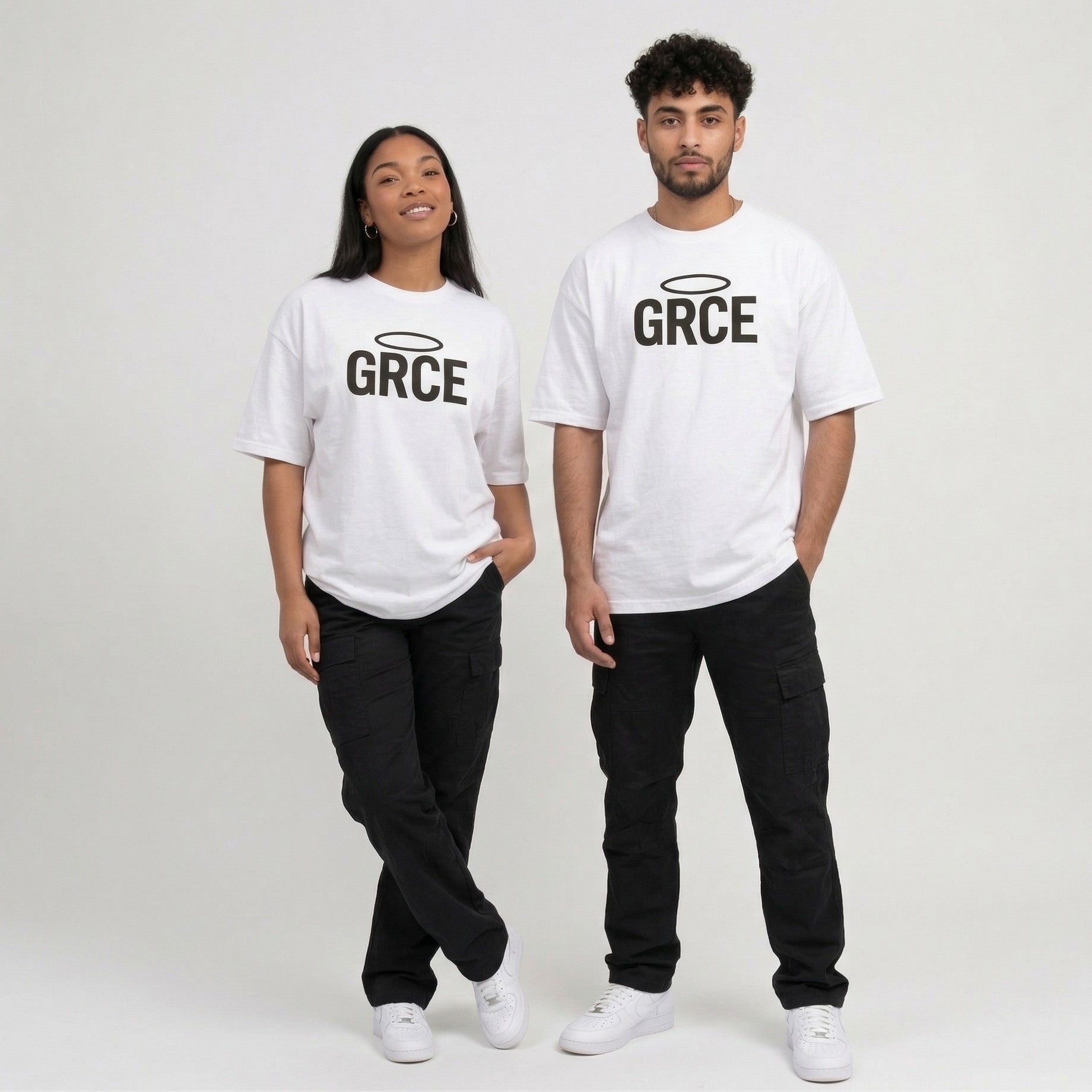 Two people wearing white t-shirts with 'GRCE' logo on a plain background