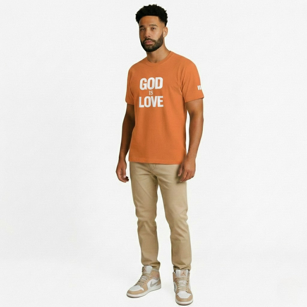 Man wearing an orange t-shirt with 'GOD IS LOVE' text on a white background