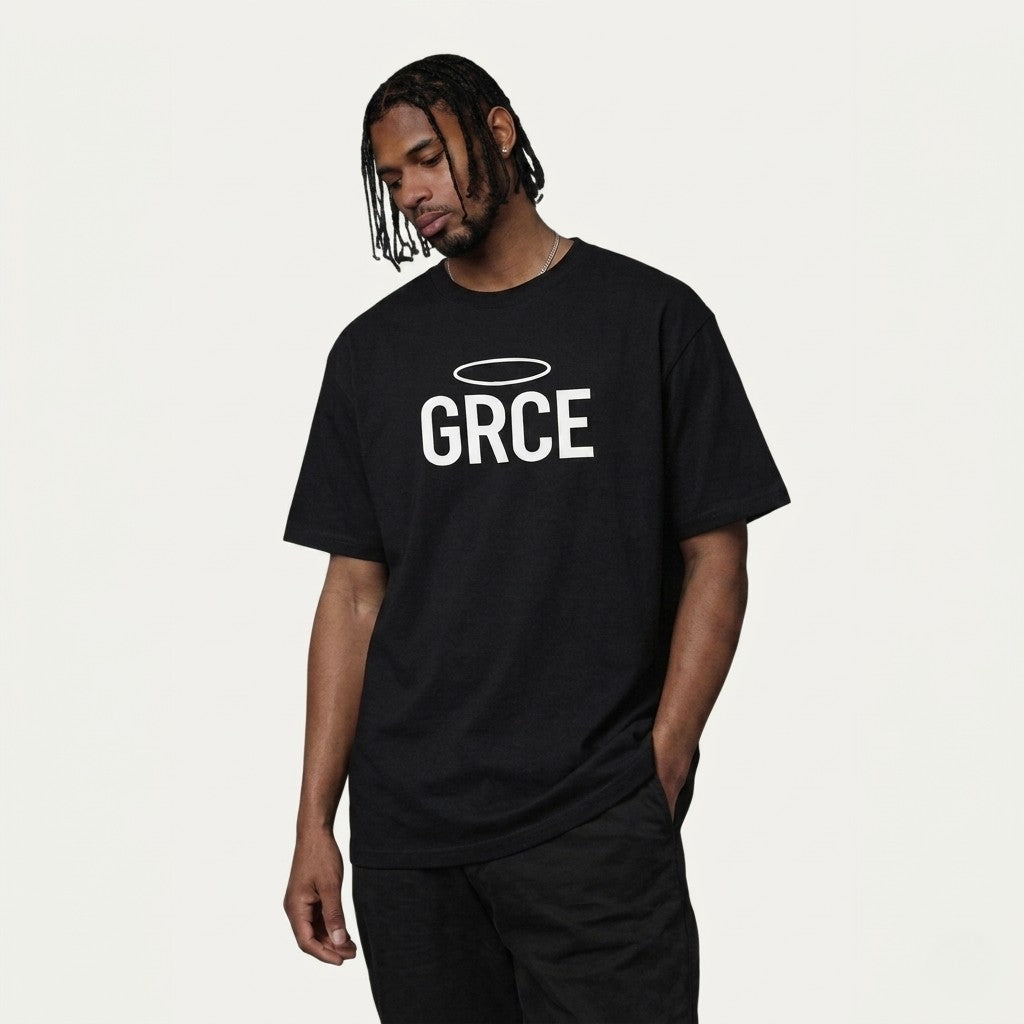 Person wearing a black t-shirt with 'GRCE' logo on a white background
