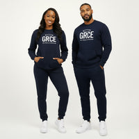 Two people wearing matching navy blue sweatsuits with 'GRCE' logo on a white background