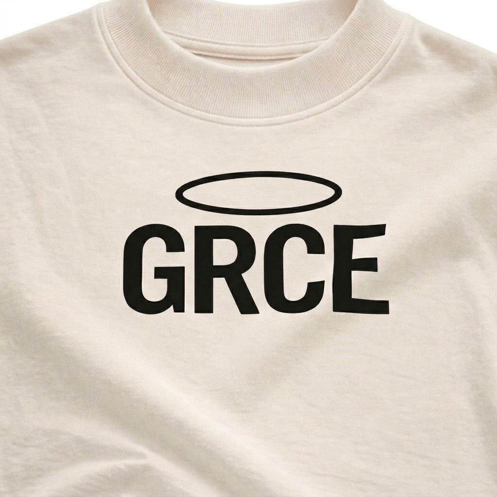 Cream t-shirt with 'GRCE' printed on it
