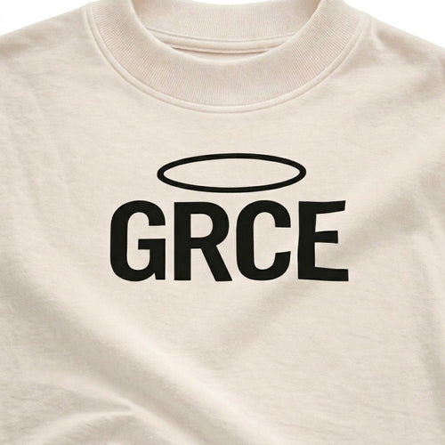 Cream t-shirt with 'GRCE' printed on it