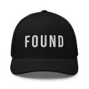 Black cap with 'FOUND' text on a white background