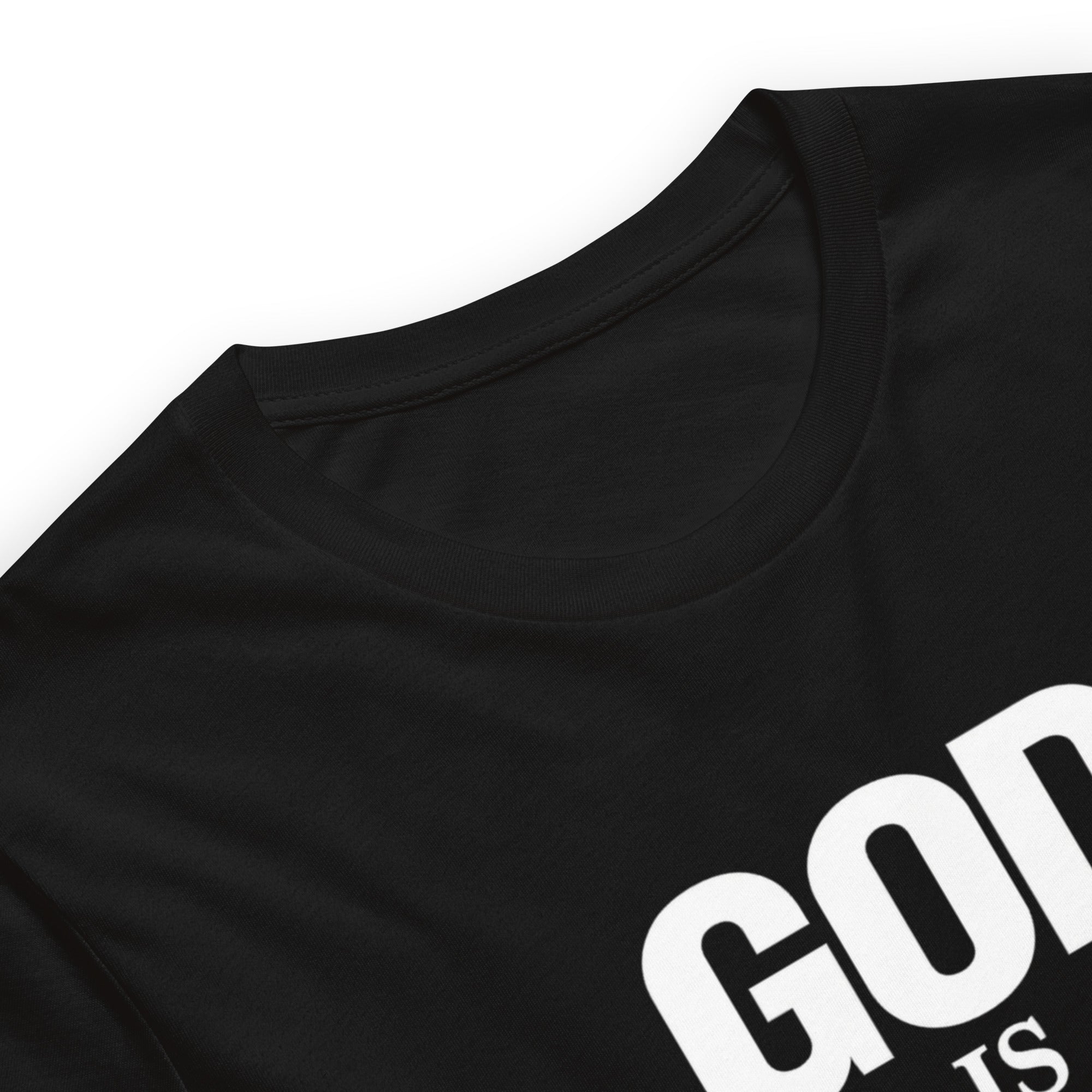 Black t-shirt with white text on a white background