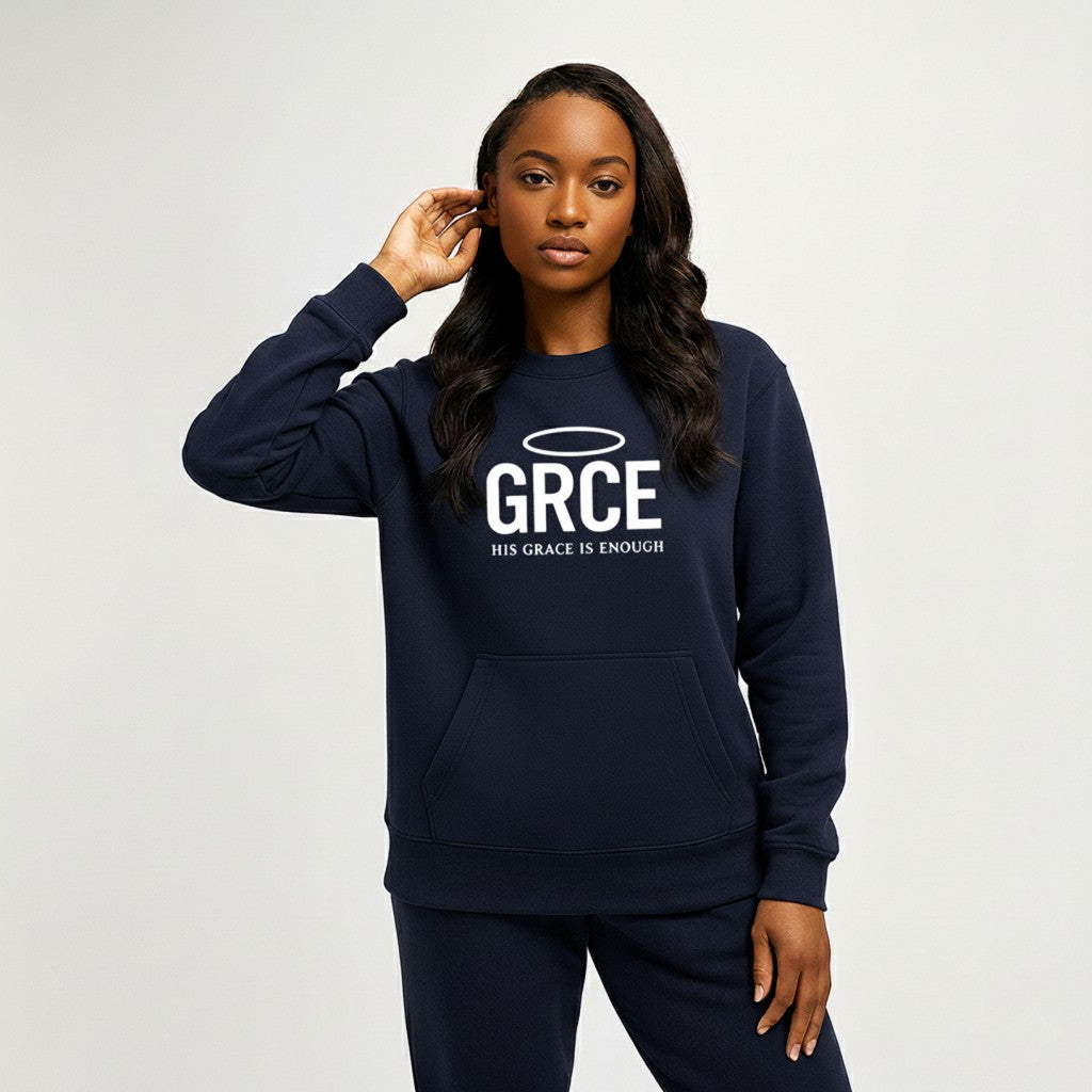 Person wearing a navy hoodie with 'GRCE' and 'His Grace is Enough' text on a light gray background