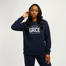 Person wearing a navy hoodie with 'GRCE' and 'His Grace is Enough' text on a light gray background